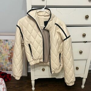 Quilted Cream Puffer Jacket with Black Trim